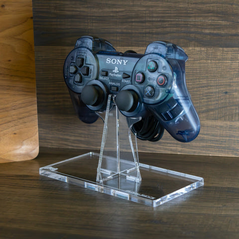 Display stand for Sony PS2 controller - Crystal Clear [Playstation 2] | Rose Colored Gaming - 1