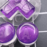 Hand cast custom resin buttons for Nintendo Game Boy Advance - Chrome Purple | Lab Fifteen Co