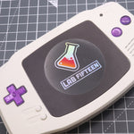 Hand cast custom resin buttons for Nintendo Game Boy Advance - Chrome Purple | Lab Fifteen Co