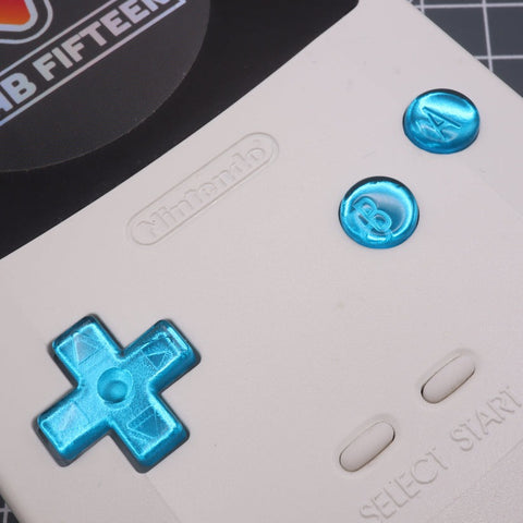 Hand cast custom resin buttons for Nintendo Game Boy Color (GBC CGB) - Chrome blue | Lab Fifteen Co